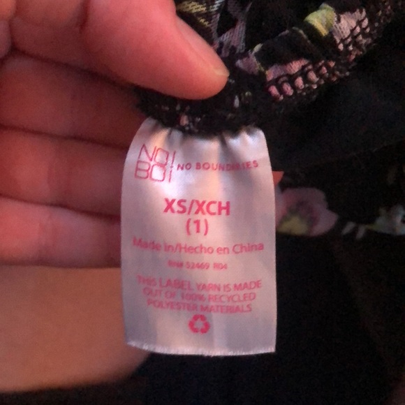 Xs dress, has a lace zip up back. it does have shorts on the inside. - Picture 3 of 3